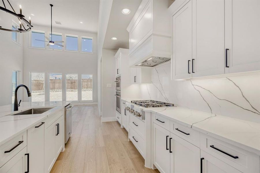 Kitchen with high end appliances and handsome hardware