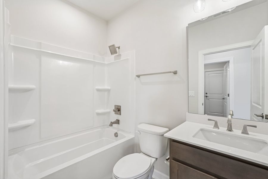 Representative furnished interior of a home built from the Beechwood Springs by Tri Pointe Homes in Altis At Serenity, Fuquay Varina (Image 12).