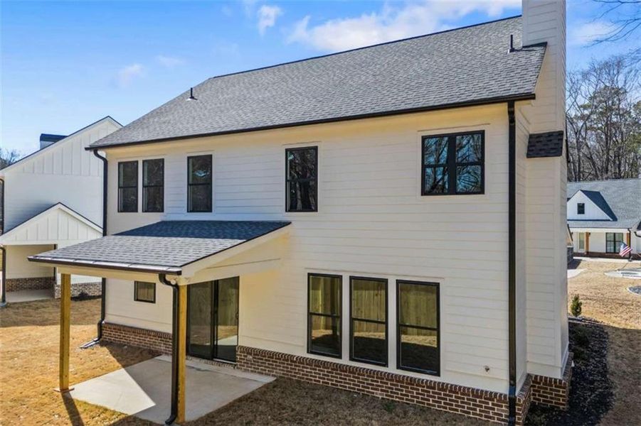 Exterior details and patio area of a home in , Monroe (Image 25).