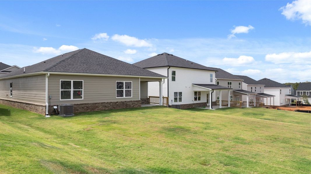 Front exterior of a new home in The Abbey at Trolley Run Station, Aiken, SC, highlighting curb appeal (Image 23).