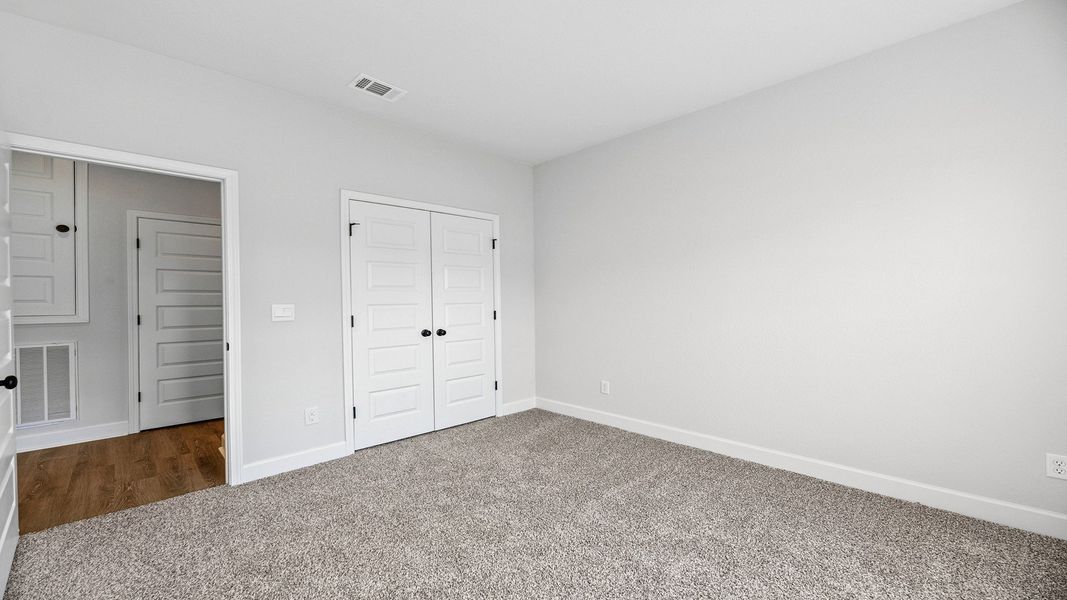 Representative unfurnished interior of a home built from the The Jasmine by D.R. Horton in Meadows at Rehwinkel, Crawfordville (Image 9).