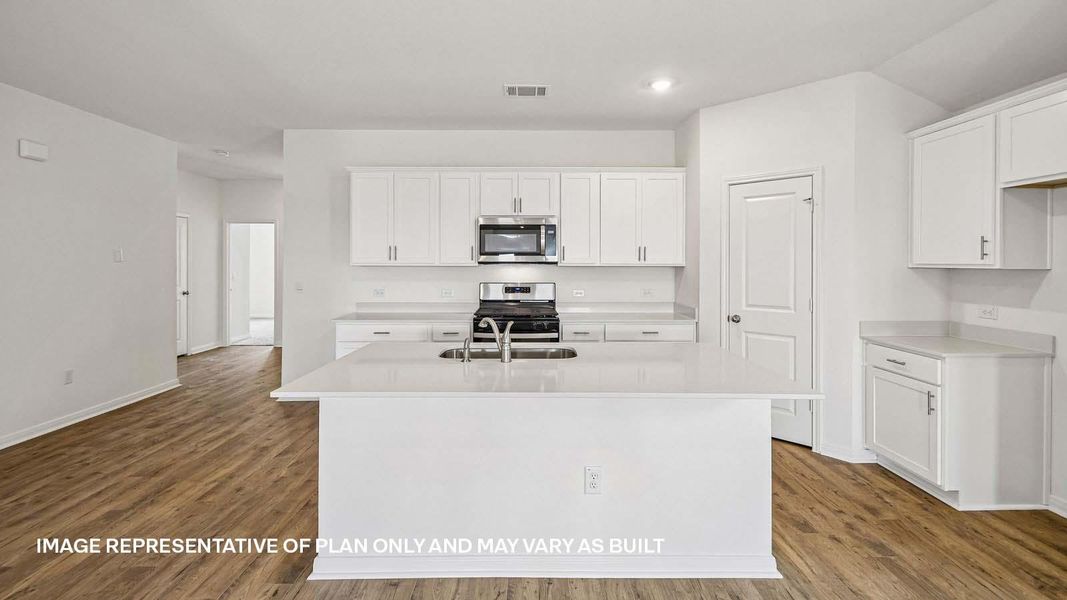 Furnished interior view inside a new home in Prairie Lakes, Buda (Image 6).
