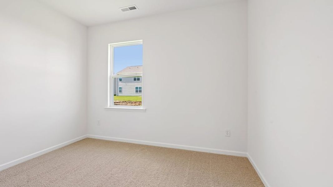 Spacious, unfurnished interior of a new home in Shahbain Reserve, Raeford (Image 31). Spacious, unfurnished interior of a new home in Shahbain Reserve, Raeford (Image 31).