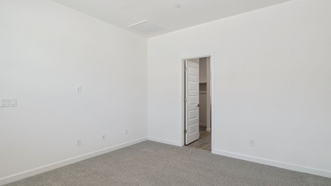 Representative unfurnished interior of a home built from the Nova by D.R. Horton in The Buttes at Mystic, Peoria (Image 23).