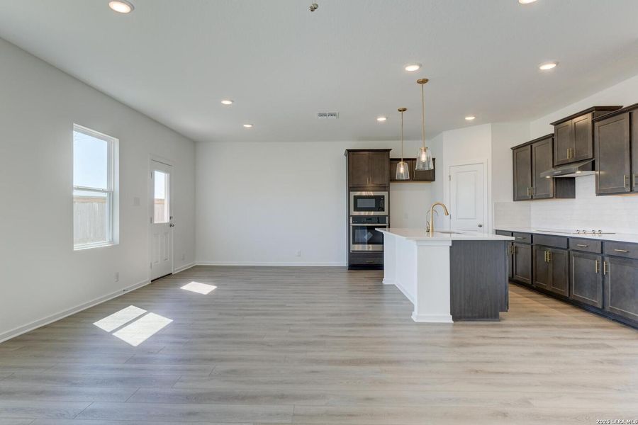 Furnished interior view inside a new home in Hennersby Hollow, San Antonio (Image 9).