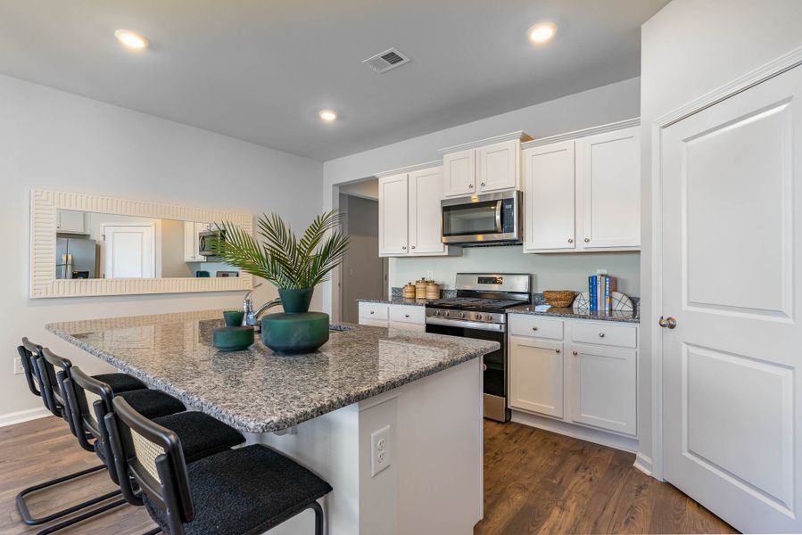 Representative furnished interior of a home built from the CALI by D.R. Horton in Kingston Bay, Conway (Image 15).