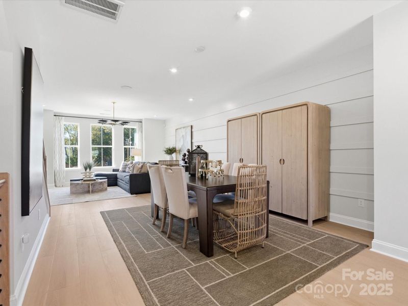 Dining Space Bridging Kitchen and Great Room. *Model Photos | Actual Finishes, Structural Selections, and Orientation May Vary. Dining Space Bridging Kitchen and Great Room. *Model Photos | Actual Finishes, Structural Selections, and Orientation May Vary.