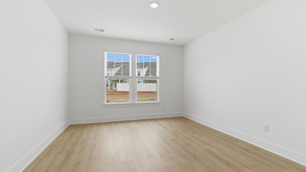 Furnished interior view inside a new home in Village at Midway, Anderson (Image 15).