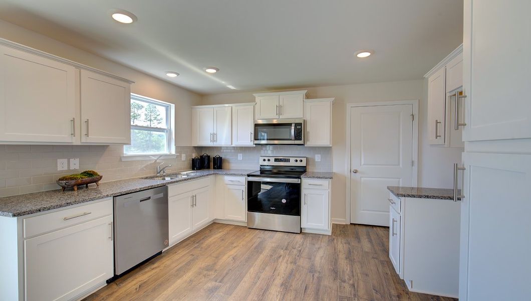 Representative furnished interior of a home built from the Clement by D.R. Horton in Aberdeen Place, Asheville (Image 5). Representative furnished interior of a home built from the Clement by D.R. Horton in Aberdeen Place, Asheville (Image 5).