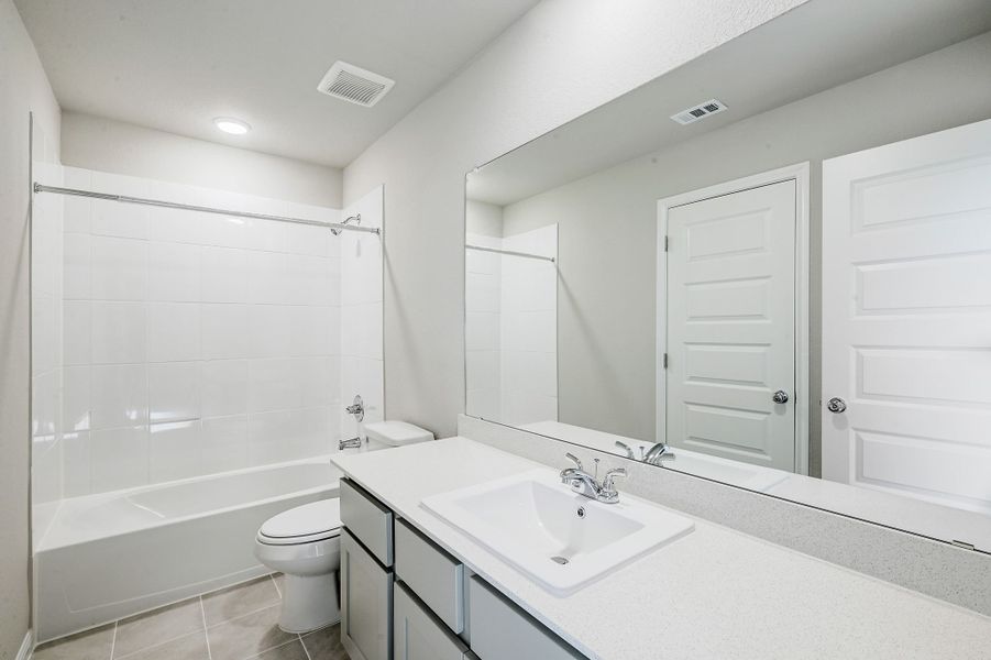 Bathroom in the Willow home plan by Trophy Signature Homes – REPRESENTATIVE PHOTO Bathroom in the Willow home plan by Trophy Signature Homes – REPRESENTATIVE PHOTO