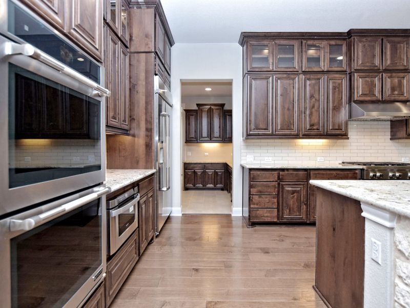 Representative furnished interior of a home built from the Avalon by Giddens Homes in Scofield Farms Estates, Georgetown (Image 110).
