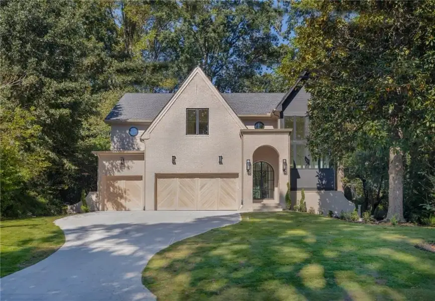Front exterior of a new home in , Brookhaven, GA, highlighting curb appeal (Image 2). Front exterior of a new home in , Brookhaven, GA, highlighting curb appeal (Image 2).