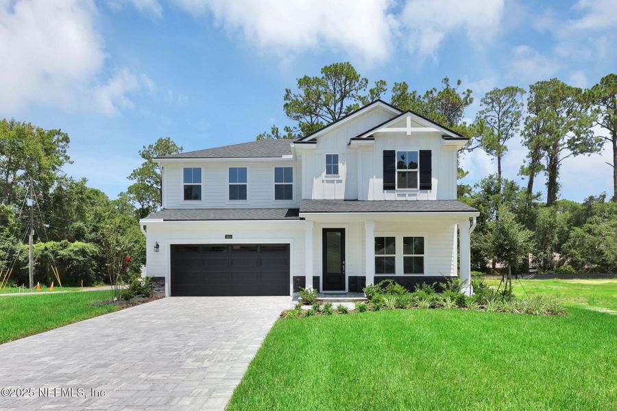 Front exterior of a new home in Creighton Pointe, Fleming Island, FL, highlighting curb appeal (Image 22).