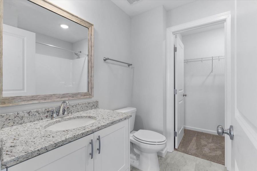 Guest Bathroom | 264 Prominence Drive, Stylish & Functional Guest Bathroom | 264 Prominence Drive, Stylish & Functional
