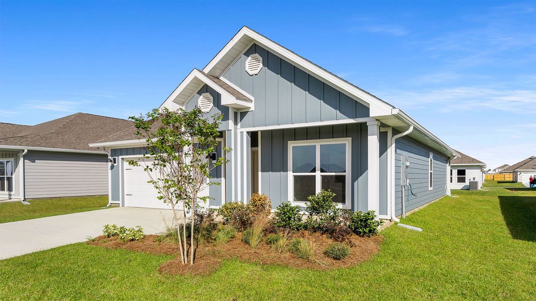 Front exterior of a new home in Titus Park, Panama City, FL, highlighting curb appeal (Image 19). Front exterior of a new home in Titus Park, Panama City, FL, highlighting curb appeal (Image 19).