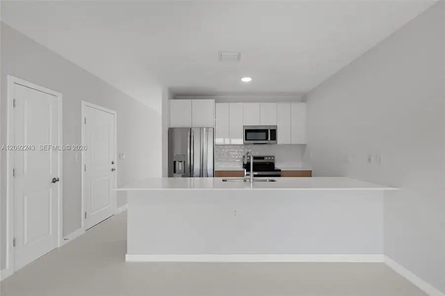 Furnished interior view inside a new home in , Miami (Image 2). Furnished interior view inside a new home in , Miami (Image 2).