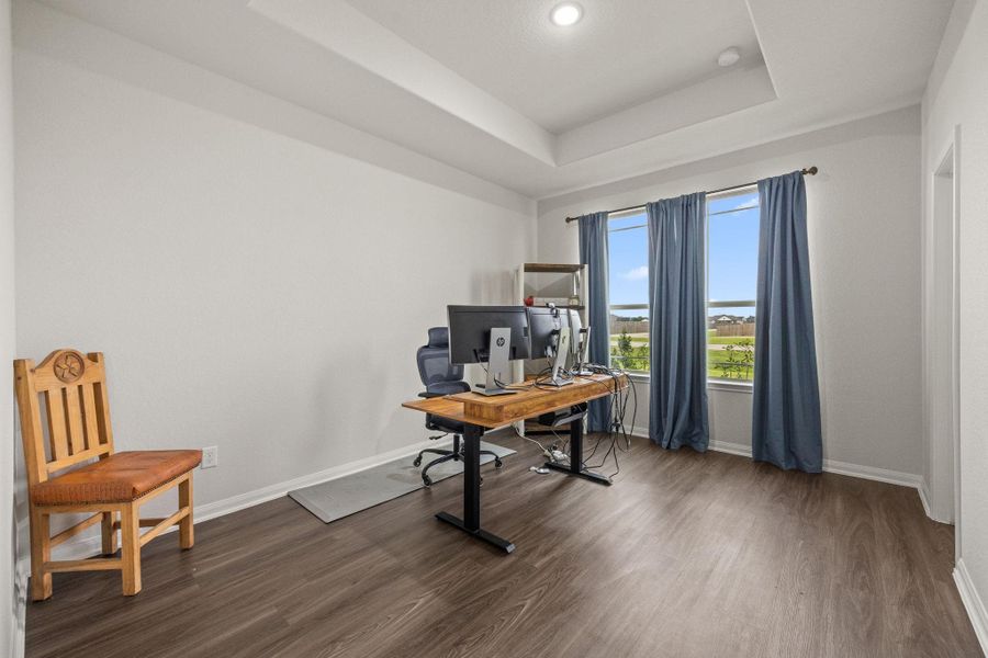 Third bedroom being used as an additional home office space.
