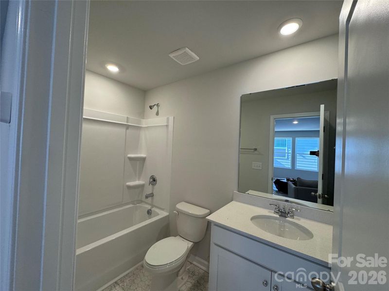 Furnished interior view inside a new home in McFarland Estates, York (Image 17).