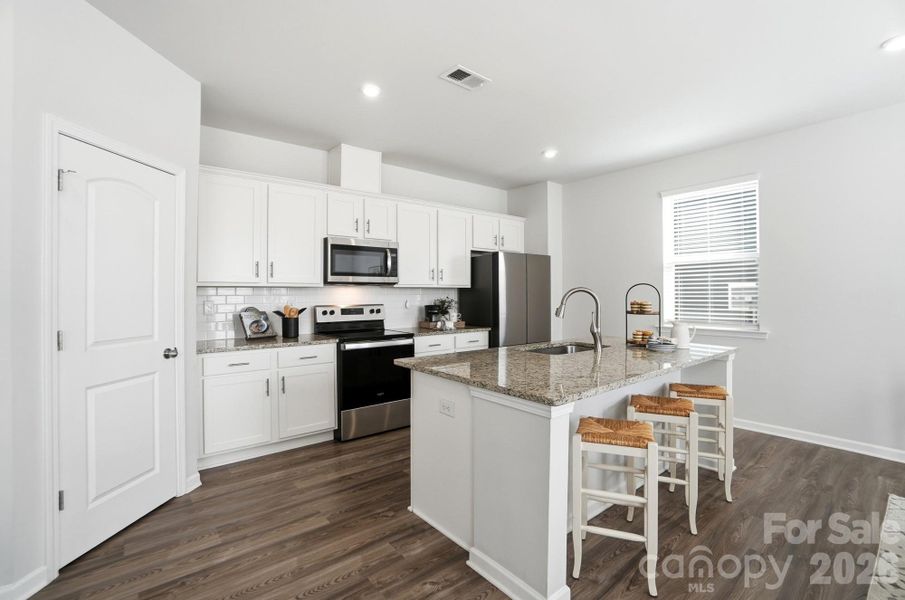 Furnished interior view inside a new home in , Monroe (Image 14).