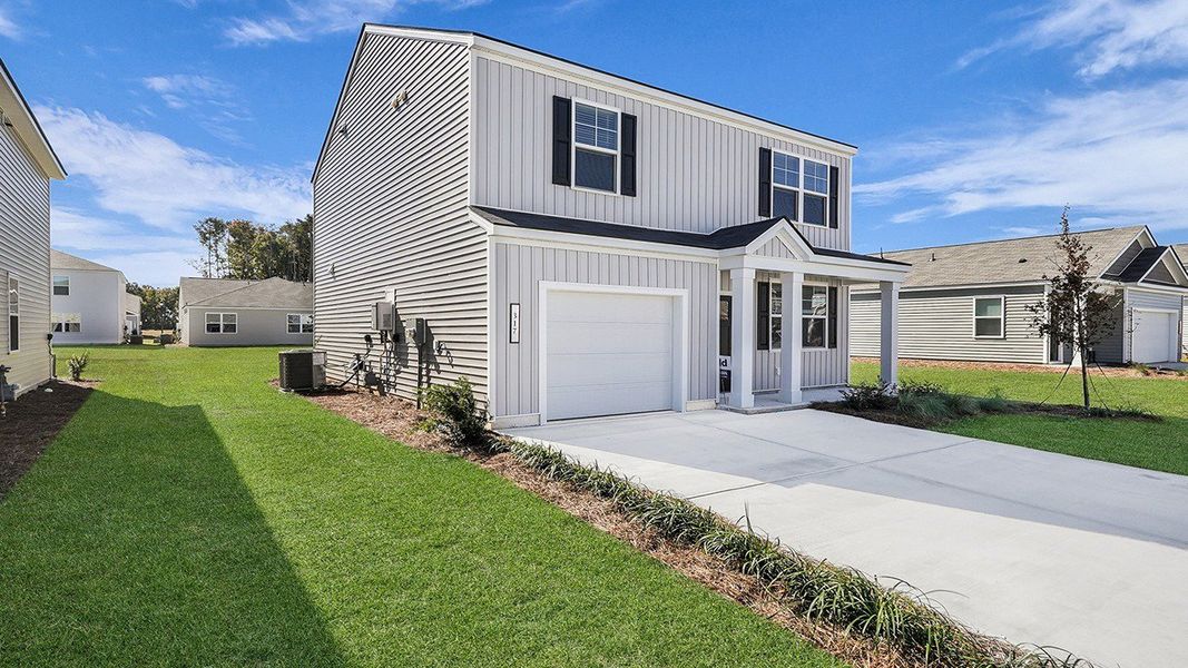 Exterior details and patio area of a home in Carolina Groves, Moncks Corner (Image 19). Exterior details and patio area of a home in Carolina Groves, Moncks Corner (Image 19).