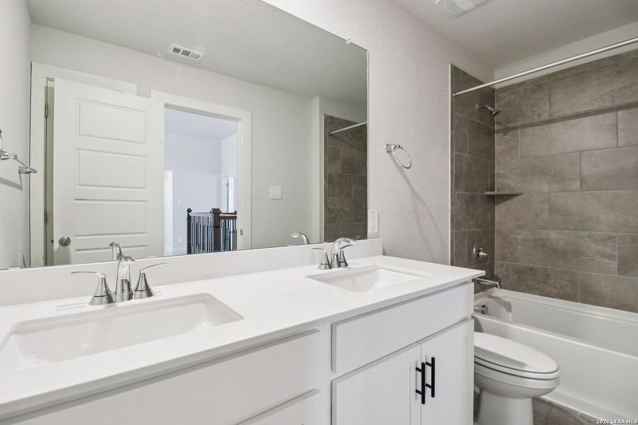 Furnished interior view inside a new home in Thomas Pond, San Antonio (Image 11).