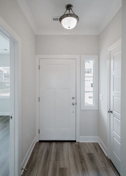 Representative unfurnished interior of a home built from the The Holland by Cothran Homes in Holly Ridge, Greenville (Image 13).