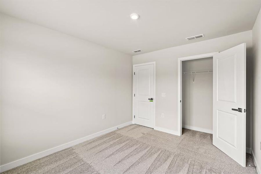 Spacious, unfurnished interior of a new home in Lakes at Riverbend, Navassa (Image 16).