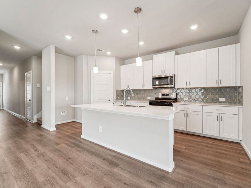 Furnished interior view inside a new home in Granger Pointe - Premier Series, Conroe (Image 4).