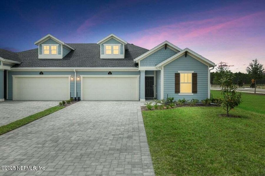 Front exterior of a new home in , St. Johns, FL, highlighting curb appeal (Image 23). Front exterior of a new home in , St. Johns, FL, highlighting curb appeal (Image 23).
