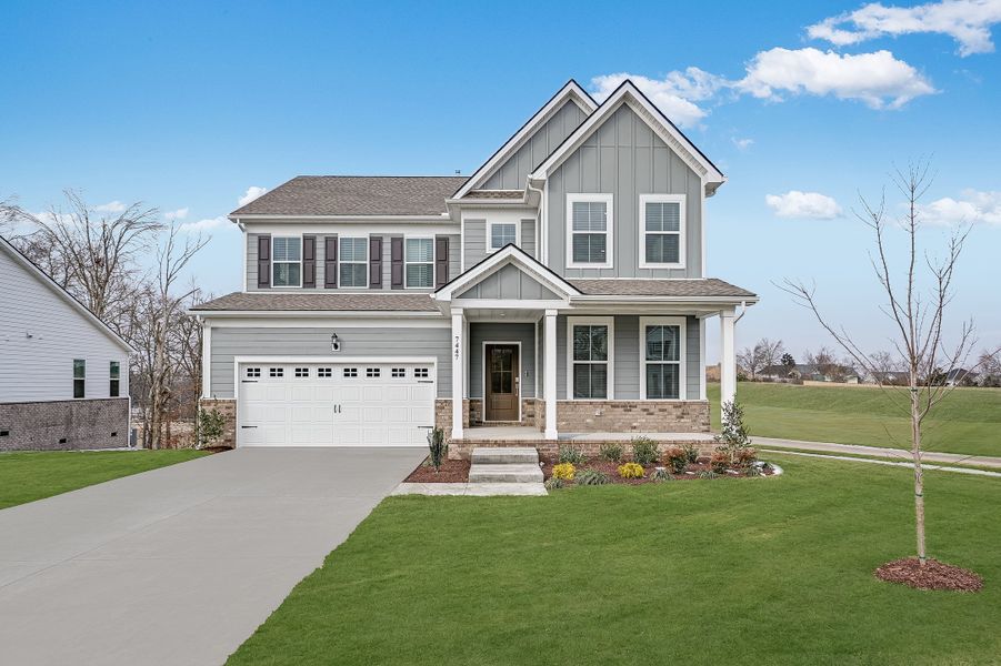Front exterior of a new home in Bowie Meadows, Fairview, TN, highlighting curb appeal (Image 1). Front exterior of a new home in Bowie Meadows, Fairview, TN, highlighting curb appeal (Image 1).