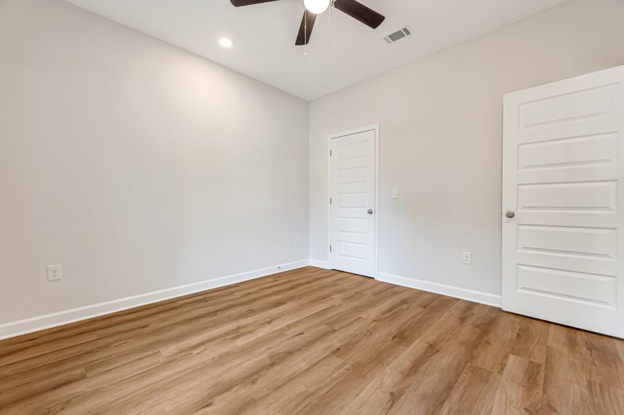 Spacious, unfurnished interior of a new home in Southern Charm, Crestview (Image 31).