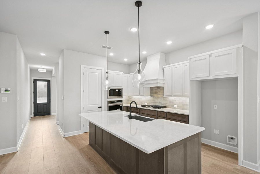 Furnished interior view inside a new home in Harvest Green 45', Richmond (Image 5).