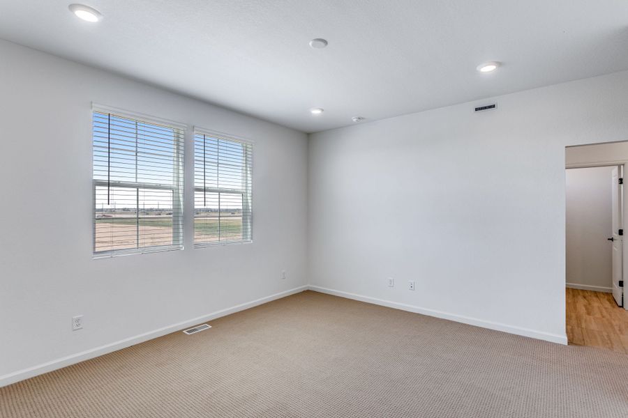 Spacious, unfurnished interior of a new home in Westside Crossing, Berthoud (Image 22).