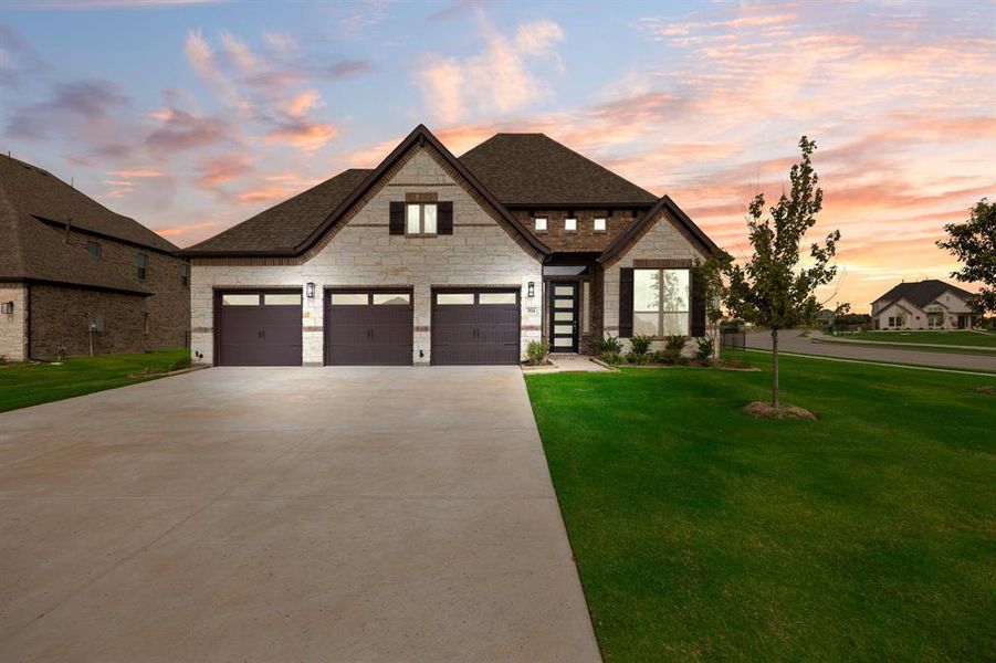 Front exterior of a new home in Heath Golf and Yacht, Heath, TX, highlighting curb appeal (Image 2).