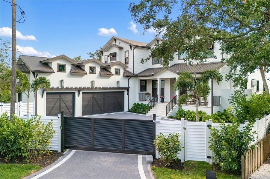 Front exterior of a new home in , Sarasota, FL, highlighting curb appeal (Image 25). Front exterior of a new home in , Sarasota, FL, highlighting curb appeal (Image 25).