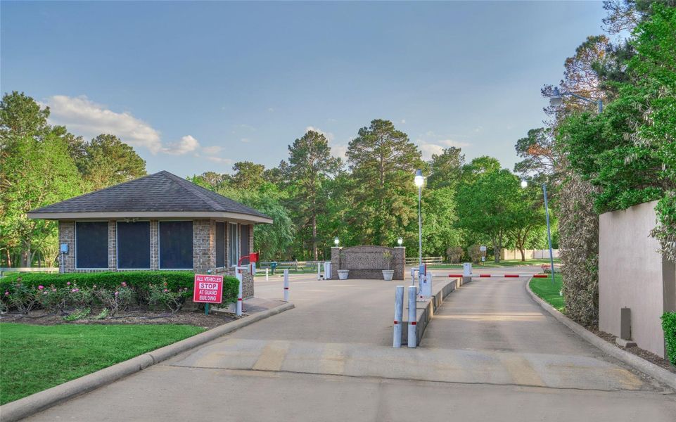 The neighborhood operates a 24/7 manned security gate offering privacy and a tranquil environment. Come home to the trees and lake lifestyle! The neighborhood operates a 24/7 manned security gate offering privacy and a tranquil environment. Come home to the trees and lake lifestyle!