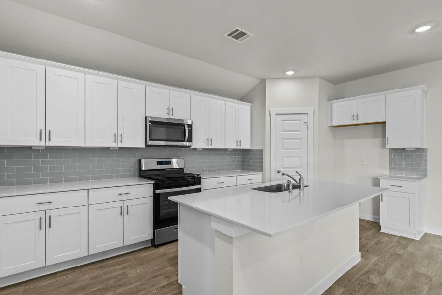 Furnished interior view inside a new home in Hartland Ranch, Lockhart (Image 6).
