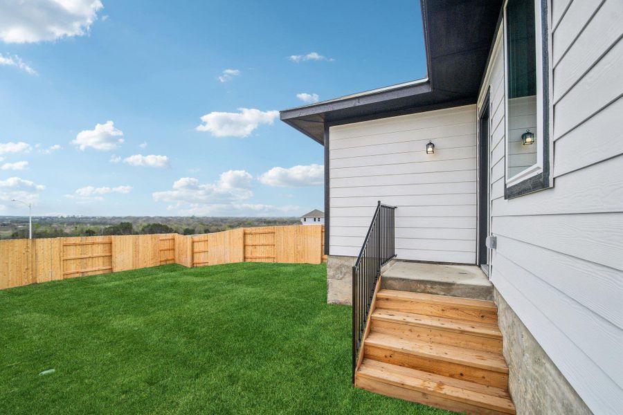 Exterior details and patio area of a home in Cloverleaf, Austin (Image 22).