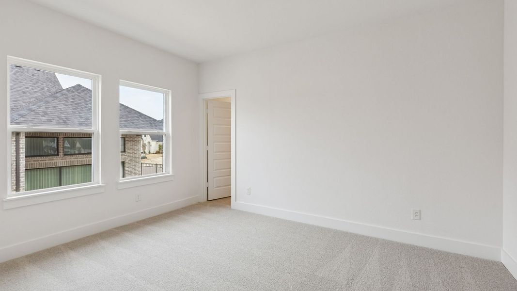 Representative unfurnished interior of a home built from the Reese II by Southgate Homes in The Reserve at Watters, Allen (Image 27).
