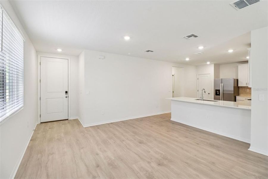 Spacious, unfurnished interior of a new home in Ridgehaven - Villas, Ormond Beach (Image 20).