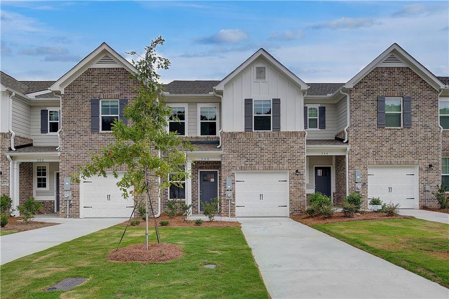 Front exterior of a new home in Avery Landing, McDonough, GA, highlighting curb appeal (Image 19).