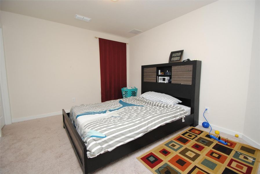 Furnished interior view inside a new home in Mason Woods, Cypress (Image 10).