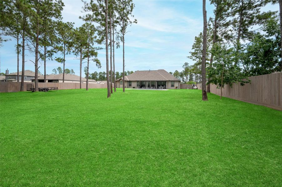 Exterior details and patio area of a home in Deer Pines, Conroe (Image 28).