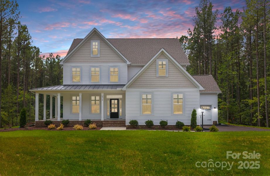 Front exterior of a new home in , Waxhaw, NC, highlighting curb appeal (Image 2).