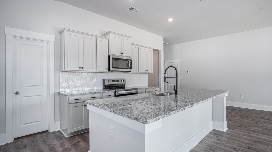 Representative furnished interior of a home built from the EATON by D.R. Horton in Coastal Farms, Conway (Image 8). Representative furnished interior of a home built from the EATON by D.R. Horton in Coastal Farms, Conway (Image 8).