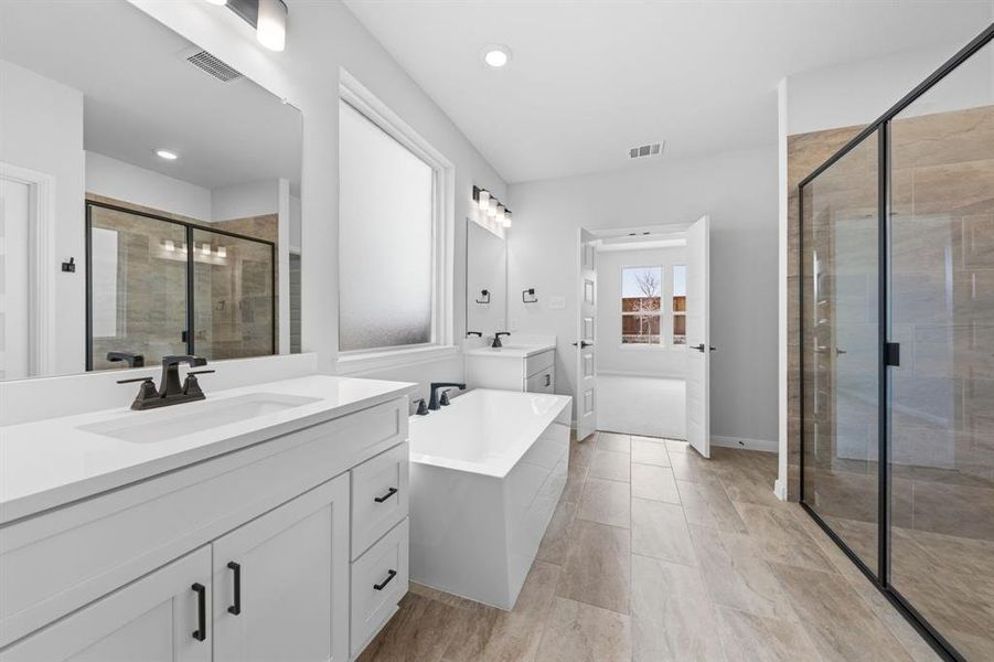 Whether you're soaking your cares away for enjoying a long, luxurious shower, you'll never want to leave this wonderful owner's bath!