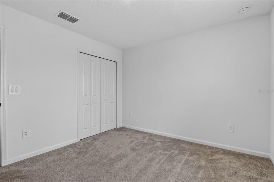 Spacious, unfurnished interior of a new home in Tara Forest East, Alachua (Image 41).