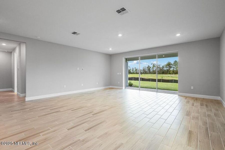 Spacious, unfurnished interior of a new home in Colbert Landings, Palm Coast (Image 17).