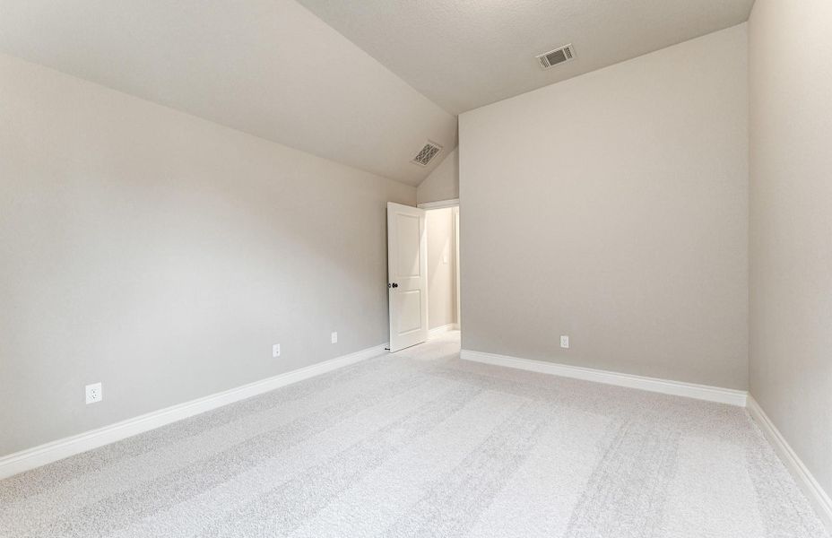 Spacious, unfurnished interior of a new home in The Woodlands Hills 65′, Willis (Image 39).