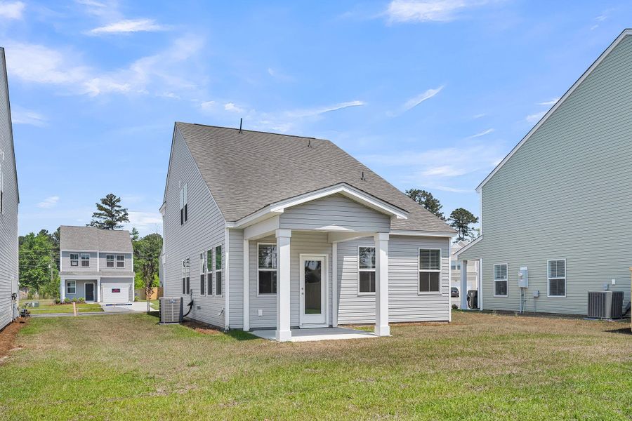 Exterior details and patio area of a home in Wildcat Chase, Summerville (Image 28).